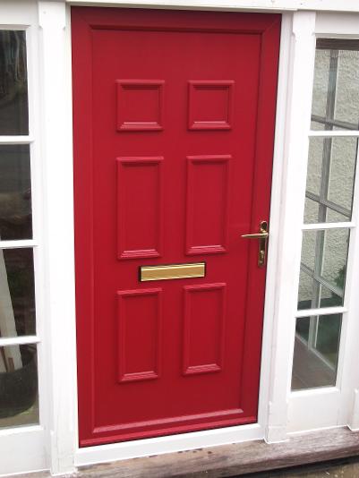 Ruby Red StormMeister Coloured Flood Door giving Automatic Flood Protection